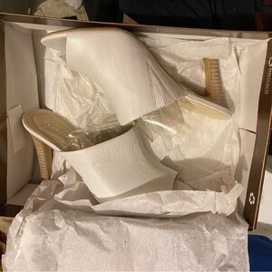 White, Franco Sarto heels, peep toes, never worn. New in Box.